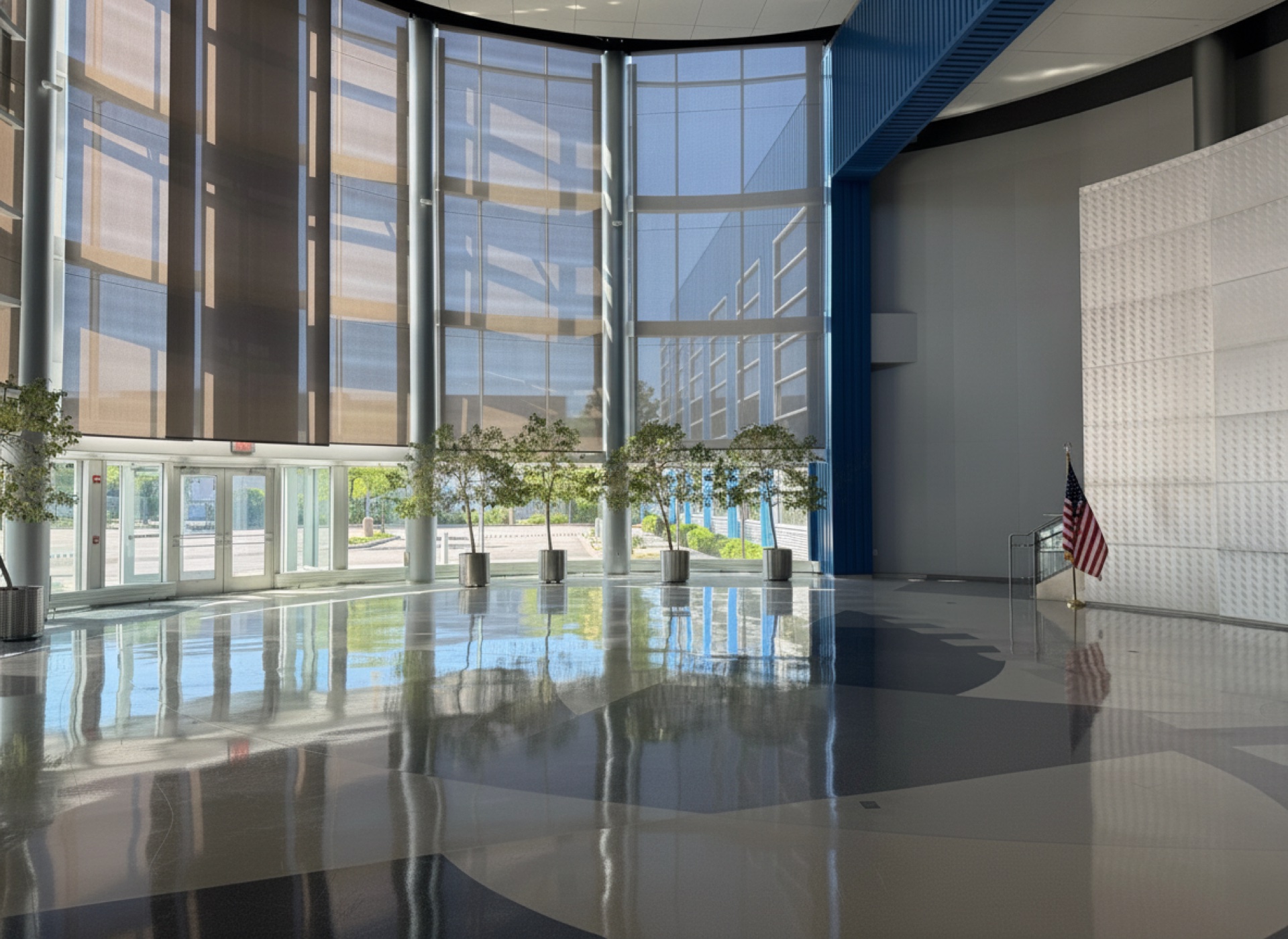 The atrium's full-height glass curtain wall