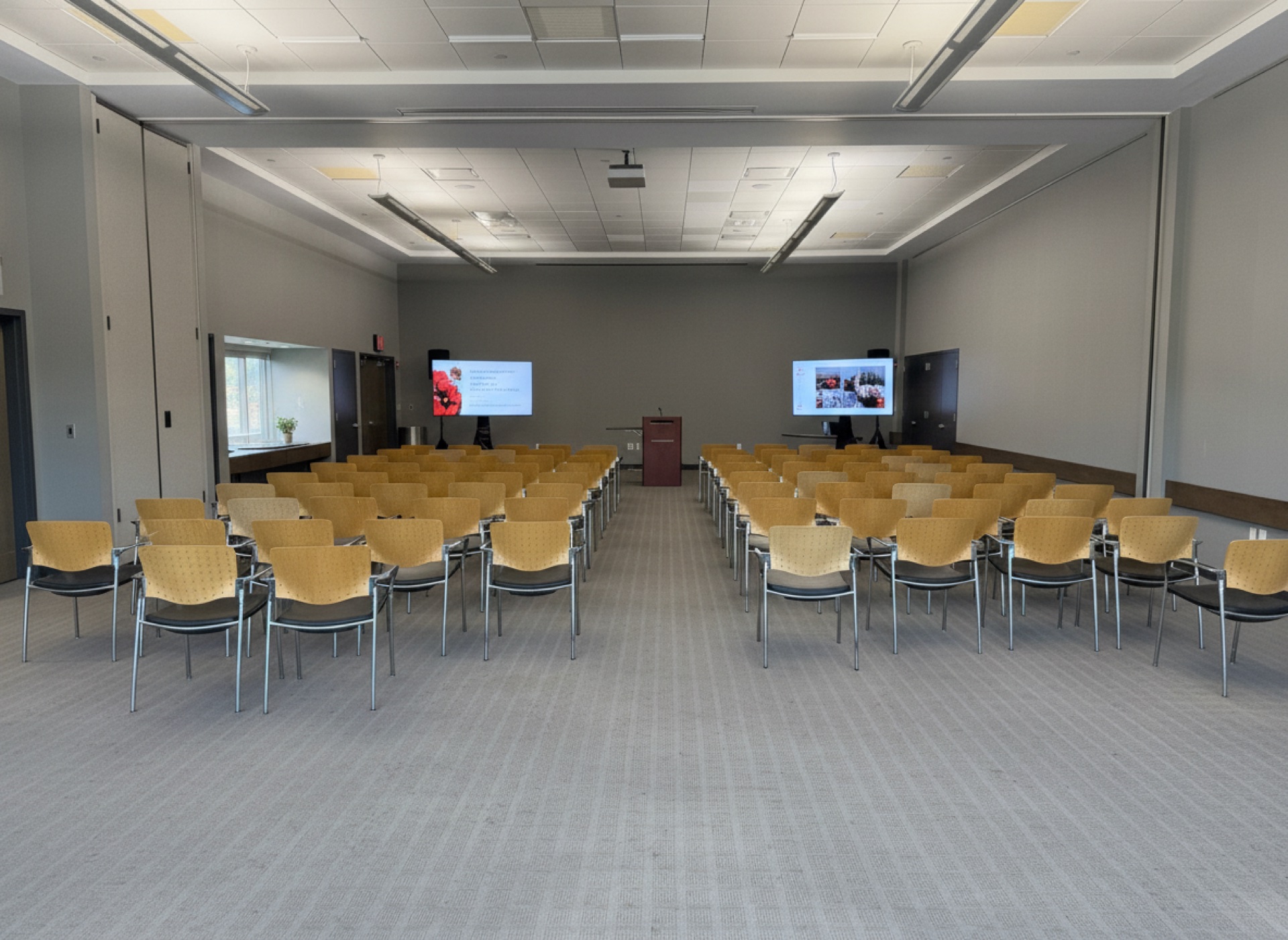 A training room set theatre-style facing two screens